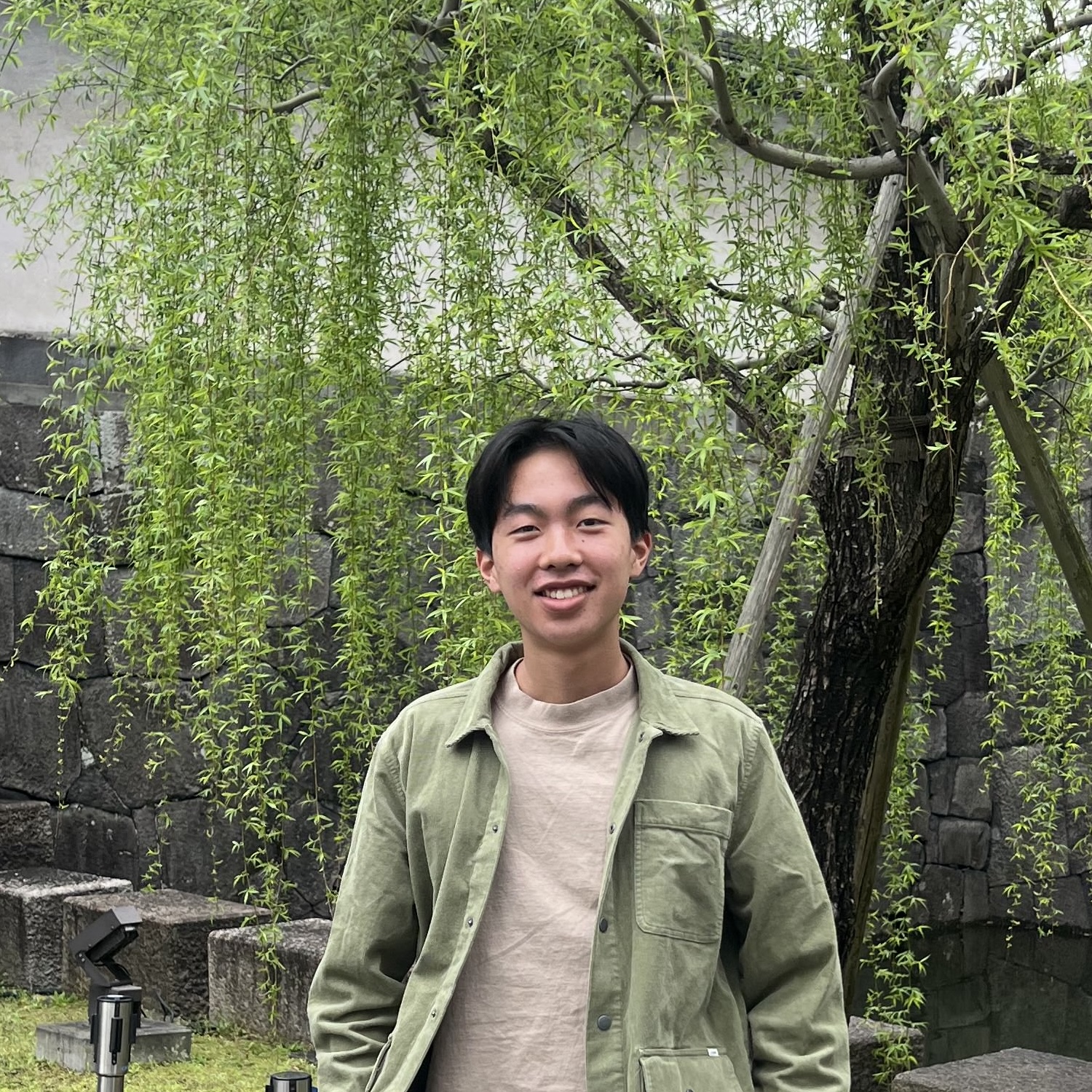 portrait headshot of Andrew Yuan